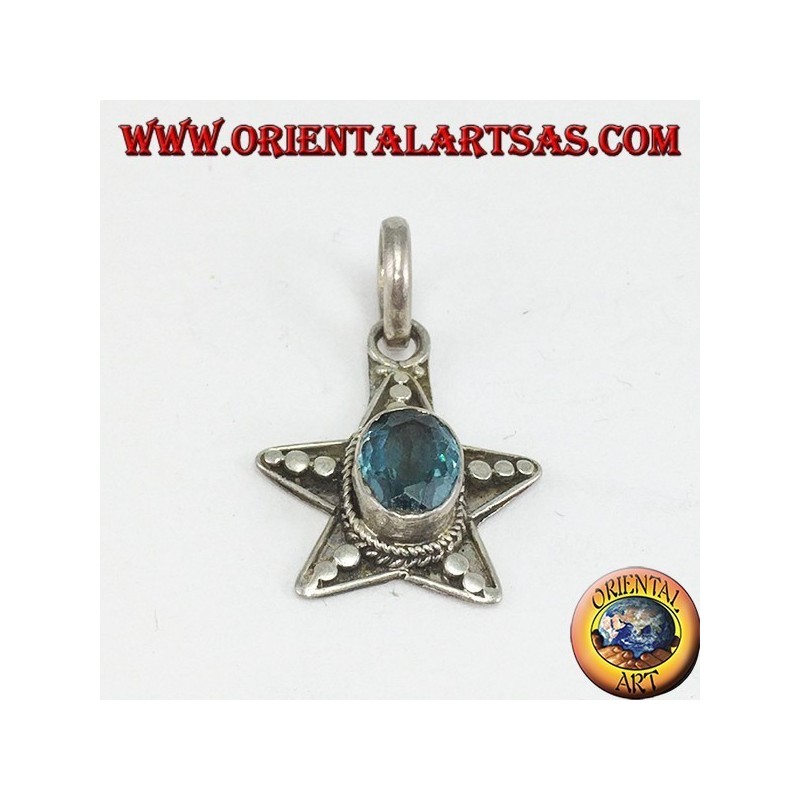 Silver star pendant with oval blue Topaz