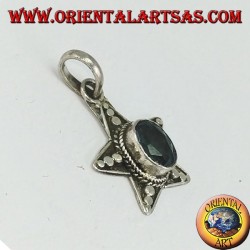 Colgante estrella de plata con topacio azul ovalado