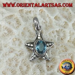 Silver star pendant with oval blue Topaz