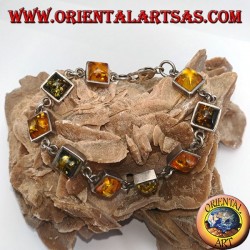 Silver bracelets with alternating green and yellow square amber