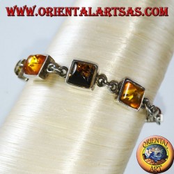 Silberne Armbänder mit abwechselnd gelbem und grünem Bernstein