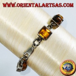 Silver bracelets with alternating green and yellow square amber