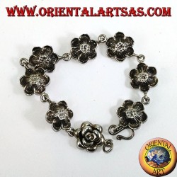 Silver bracelet of big roses