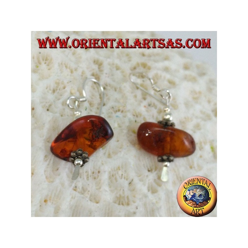 Silver earring with a piece of amber