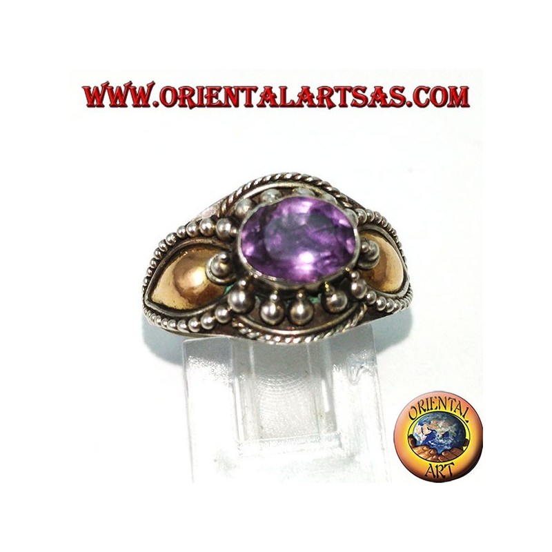 Silver ring with amethyst and gold plates