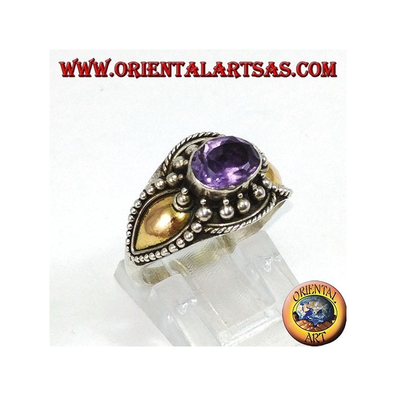 Silver ring with amethyst and gold plates