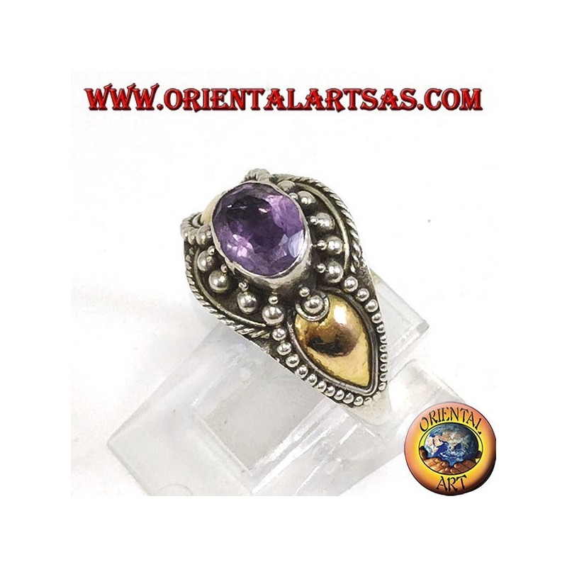 Silver ring with amethyst and gold plates