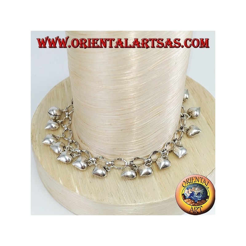 Bracciale in argento ad anelli cuori pendenti e campanellino
