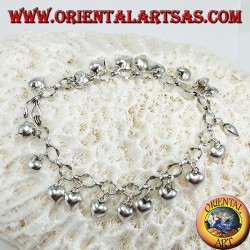 Silver bracelet with hanging hearts and bell ring