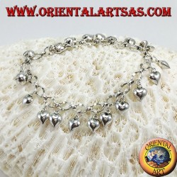 Silbernes Armband mit hängenden Herzen und Glockenring