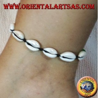 Anklet and bracelet double use of cowrie cauri shells, adjustable with rasta balls