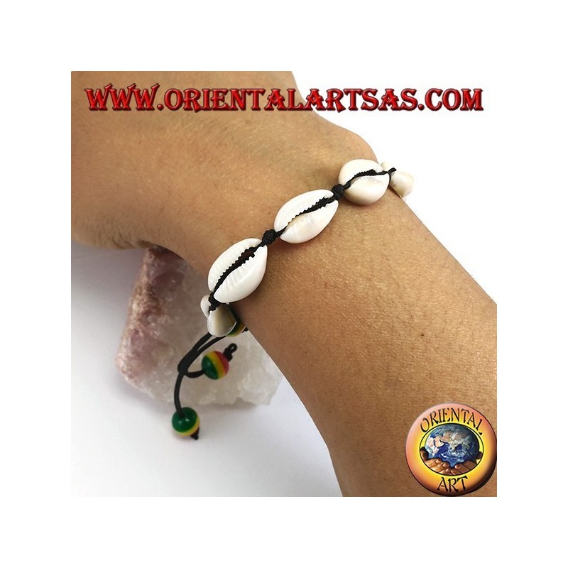Anklet and bracelet double use of cowrie cauri shells, adjustable with rasta balls
