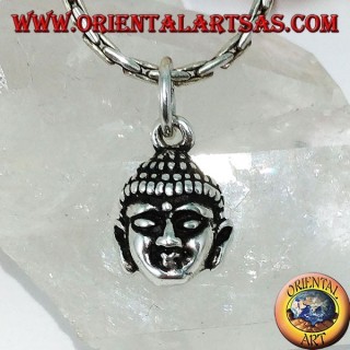 Silver pendant of a small Buddha head
