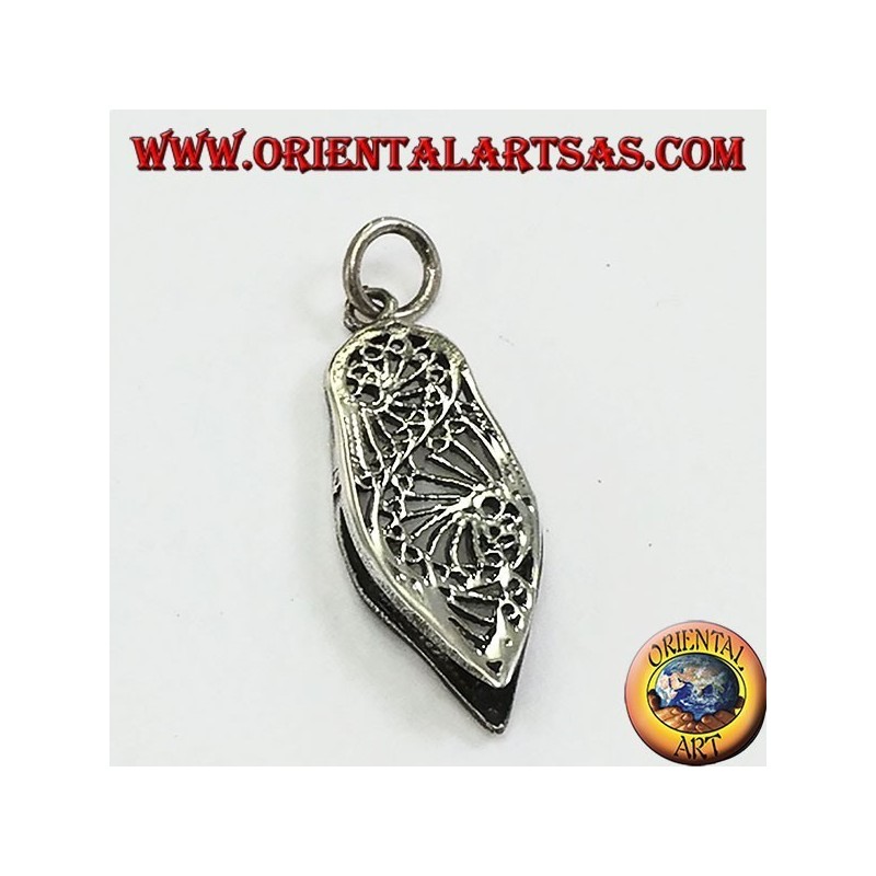 Silver pendant of a typical Indian shoe