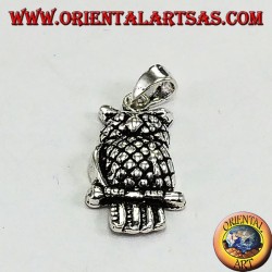 Silver eagle owl pendant on the branch