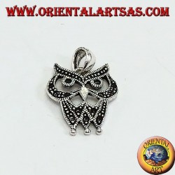 Silver pendant with dotted owl