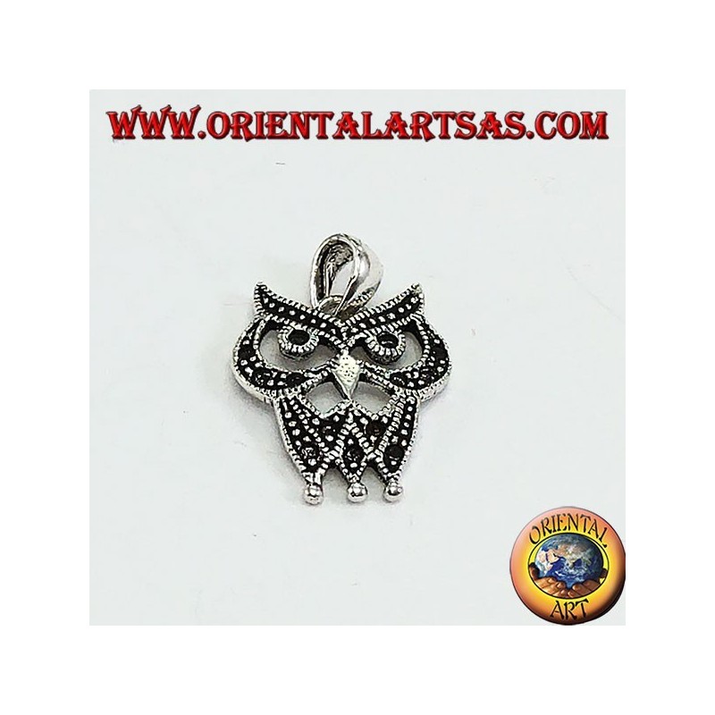 Silver pendant with dotted owl