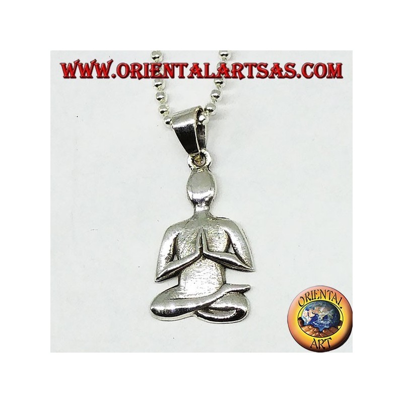 Silver pendant meditation in Sukhasana posture