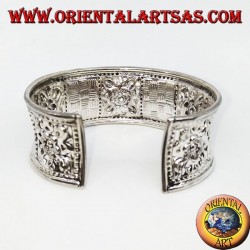 Hand-chiselled wide silver bracelet with square floral motifs