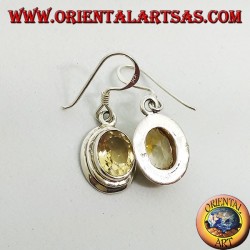 Pendientes de plata con topacio facetado oval natural.