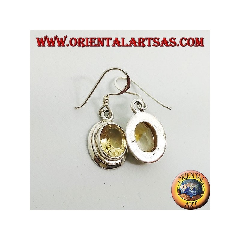 Silver earrings with faceted oval natural Topaz