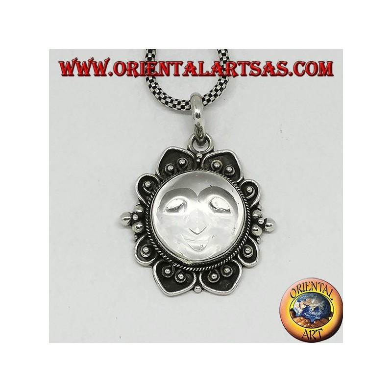 Silver pendant with sun engraved on rock crystal and decorated border