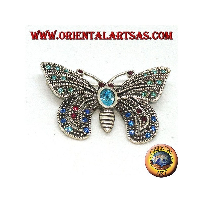Broche de plata con piedras semipreciosas surtidas en forma de mariposa.