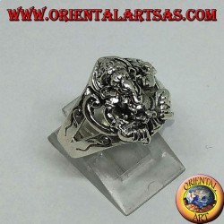 Silver ring with seated Ganesh with six side ring decorations