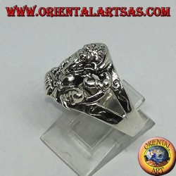 Silver ring with seated Ganesh with six side ring decorations