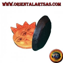 Burning sun and moon incense in hand painted pine wood