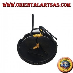 Burning incense, wrought iron ashtray, the cracked