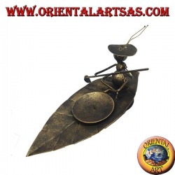 Wrought iron candle holder, ant ferrying machine on the leaf