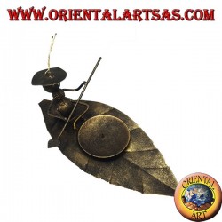 Wrought iron candle holder, ant ferrying machine on the leaf