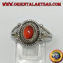 Silver ring with carnelian cabochon surrounded by three serpentine threads