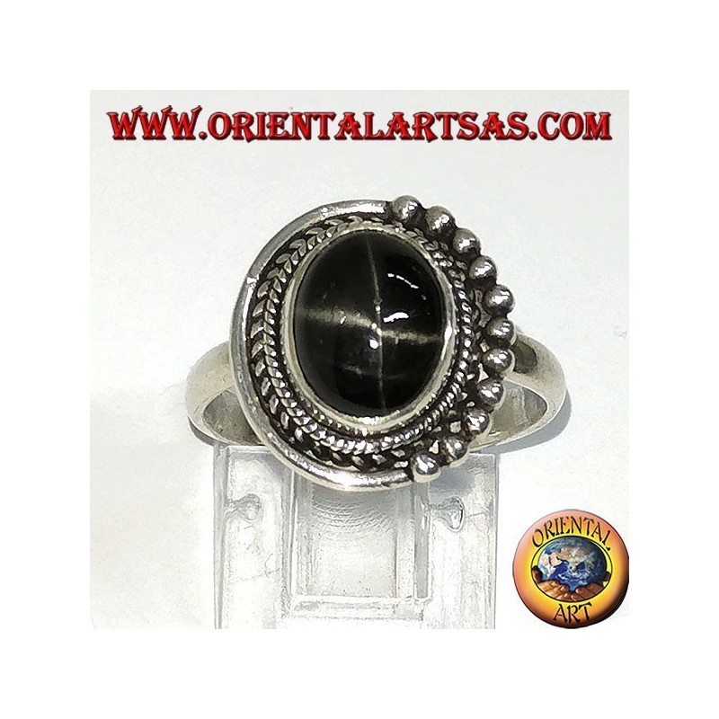 Silver ring with black oval set inlaid