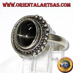 Bague en argent avec étoile noire, sertie ovale