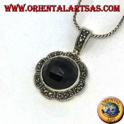 Silver pendant with faceted round onyx and marcasite on the flower border