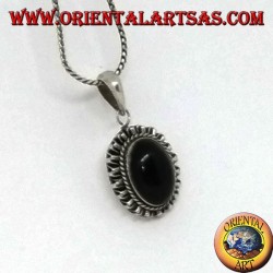 Silver pendant with oval onyx and wavy edge