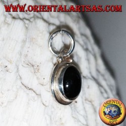Silver pendant with black star (Diopside) oval and smooth edge