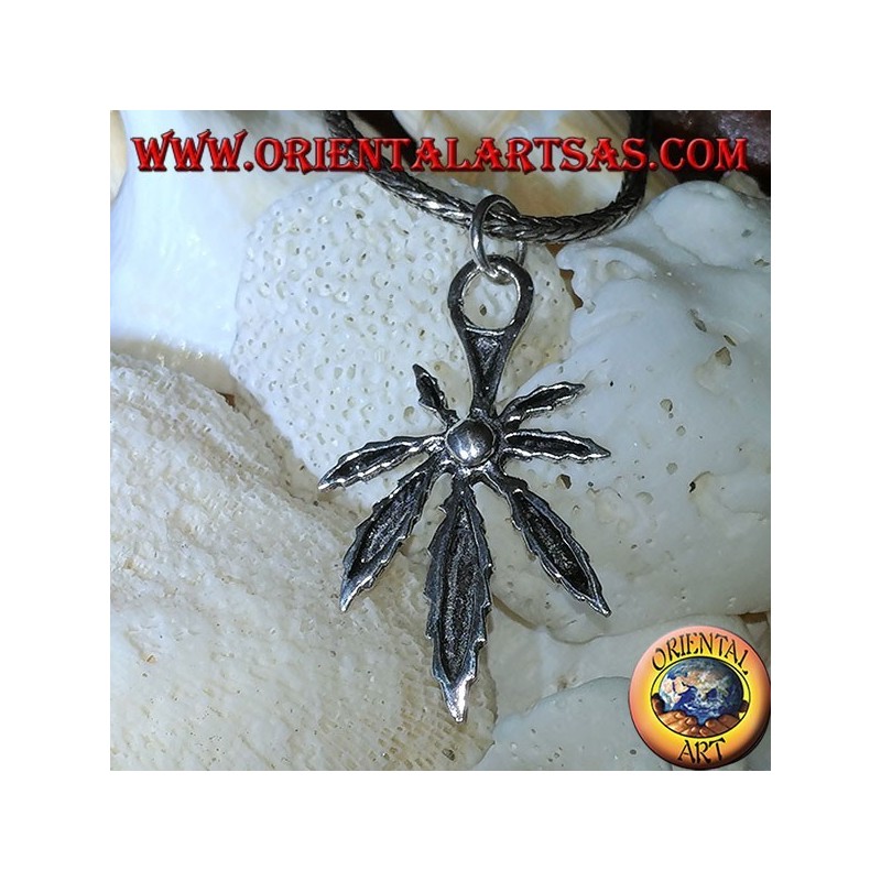 Silver pendant of a marijuana leaf