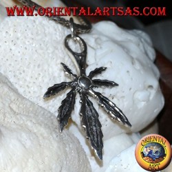 Silver pendant of a marijuana leaf