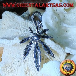 Silver pendant of a marijuana leaf
