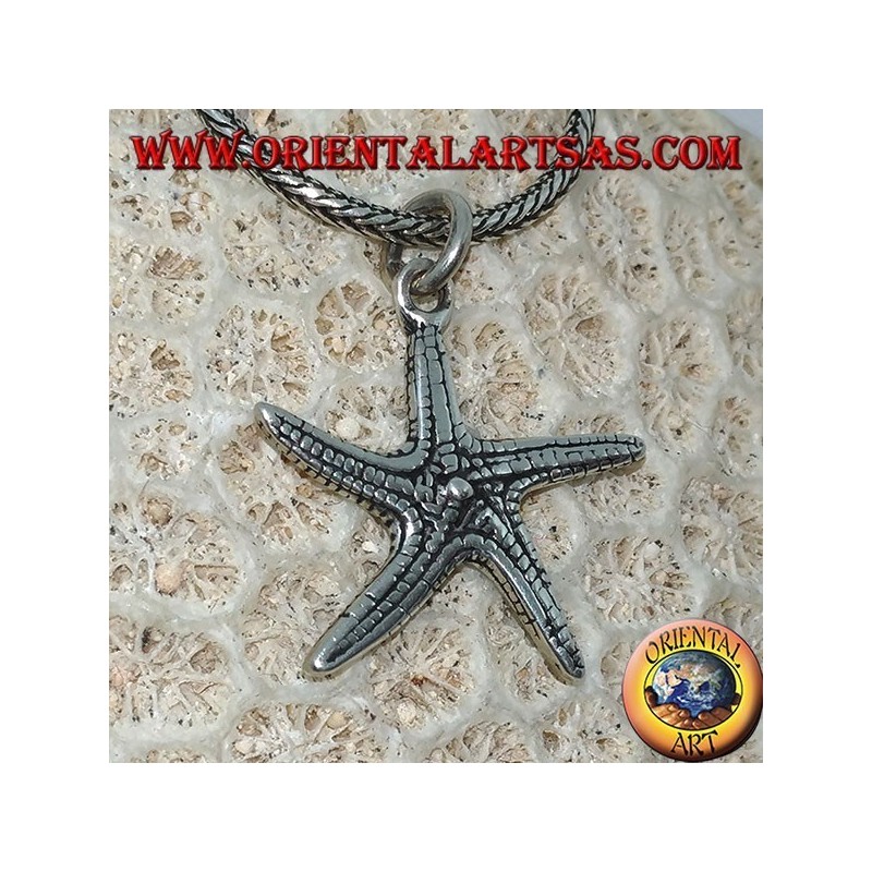 Silver pendant in the shape of a double-sided starfish