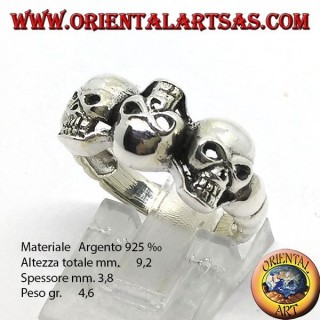 Silver skull ring with garnet eyes