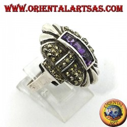 Silver ring with marcasite and three square amethysts in a row in the center