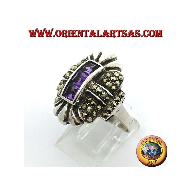 Silver ring with marcasite and three square amethysts in a row in the center