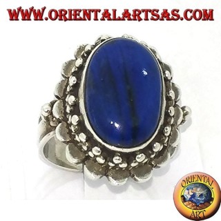 Silver ring with large oval lapis lazuli surrounded by balls