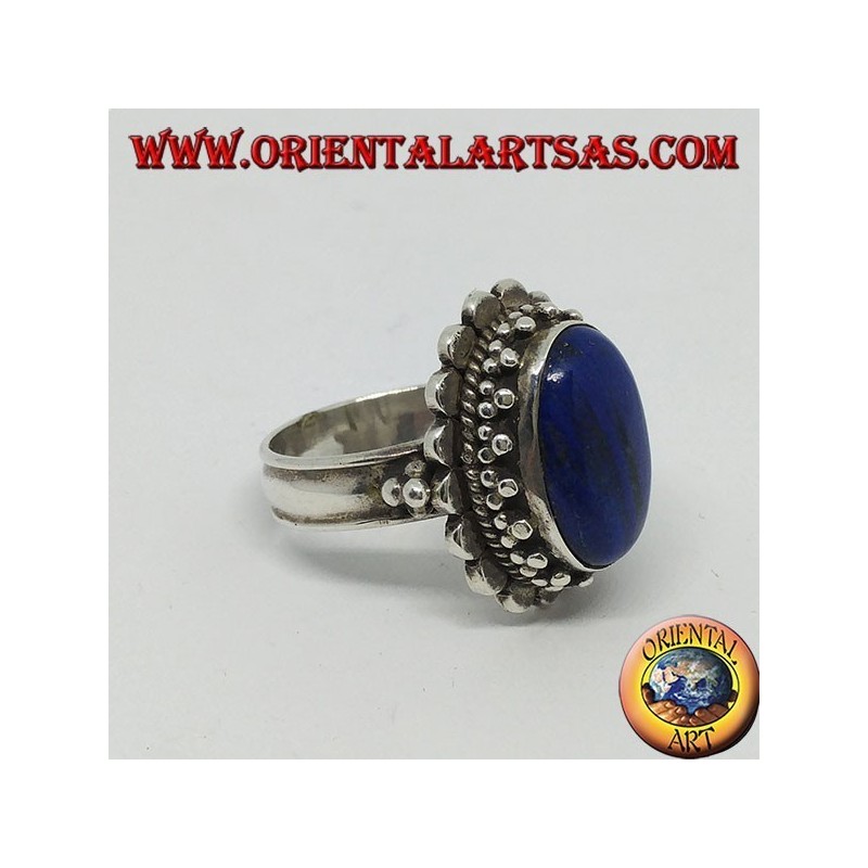 Silver ring with large oval lapis lazuli surrounded by balls