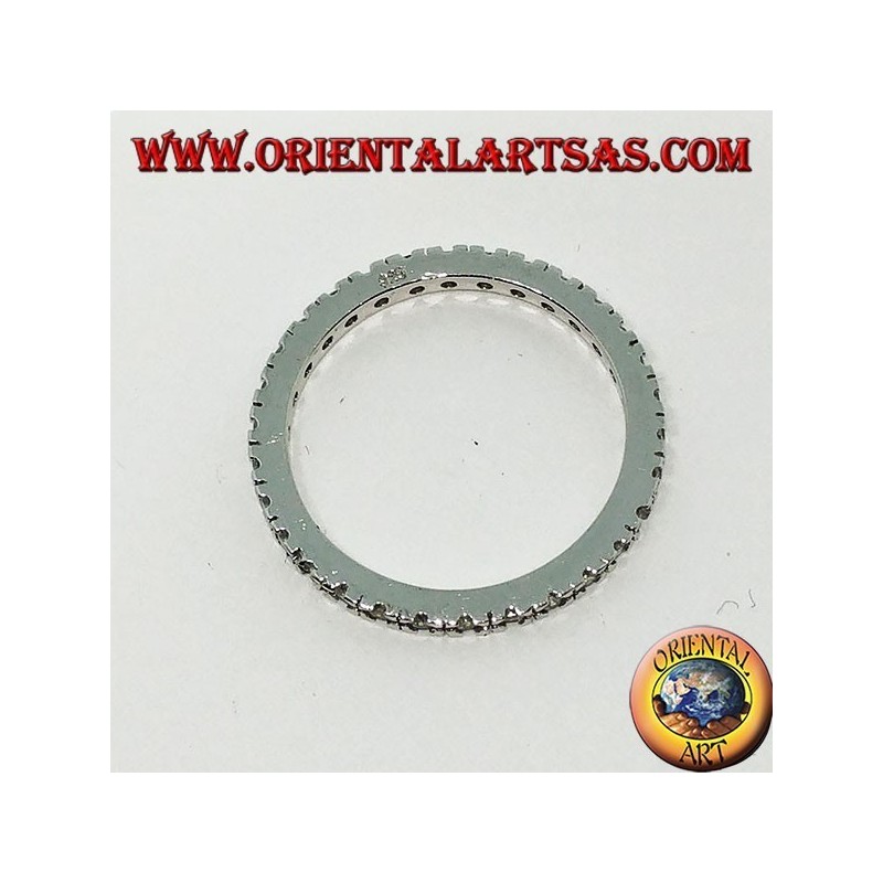 Silver ring (wedding ring) with zircons set