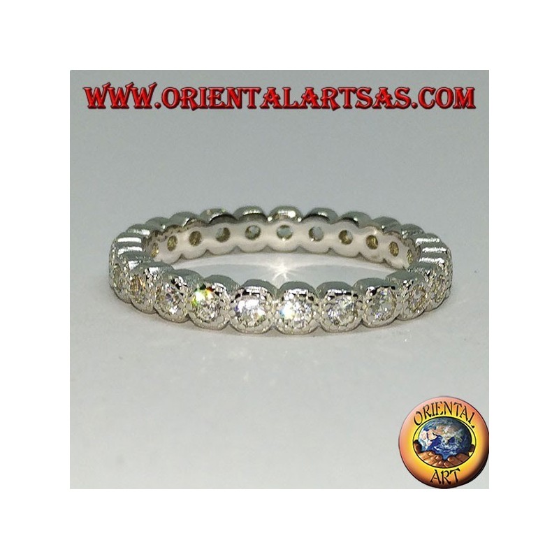 Bague en argent (alliance) avec zircons fixés individuellement